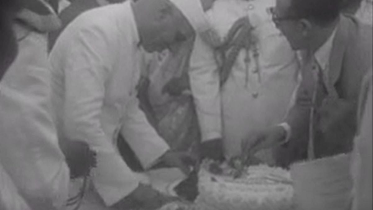 Pandit Jawaharlal Nehru cuts cake in celebrations of independence day in 1954